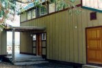 Picture of cabin front door and shed